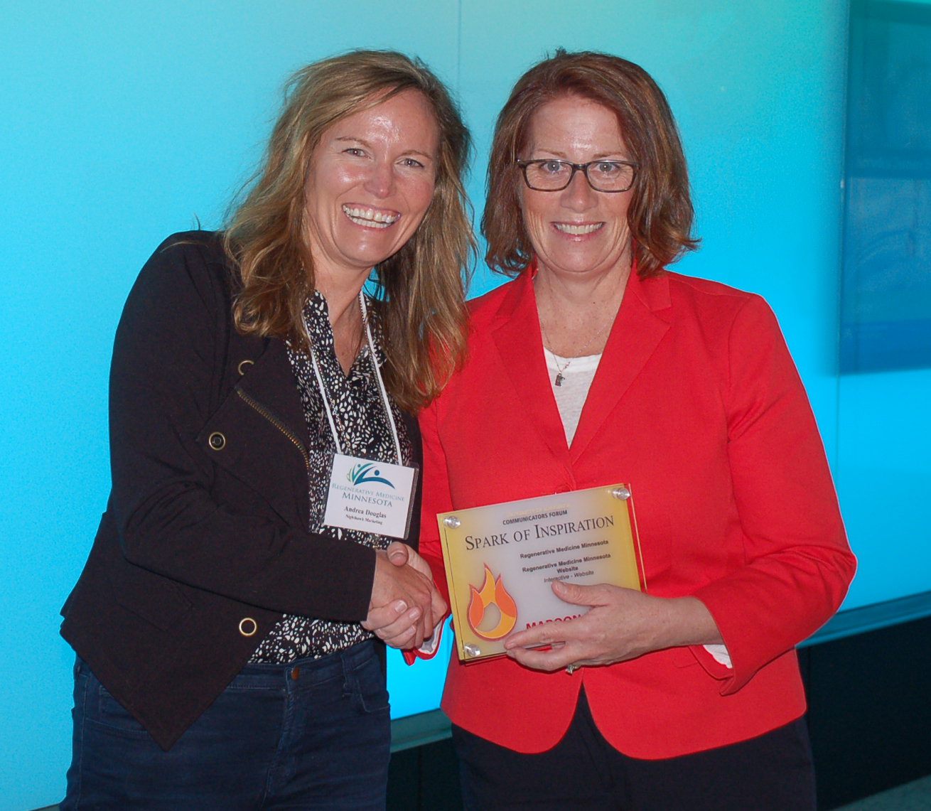 Andrea Douglas with Rep. Erin Murphy. Douglas’s company, Nighthawk Marketing, was awarded a continuation of funding to continue building, maintaining, and improving the RMM website. 