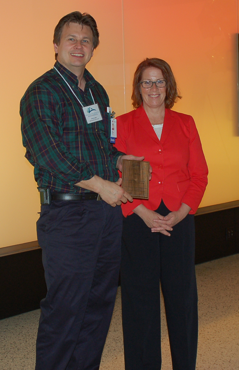 Dr. Troy Lund and Rep. Erin Murphy. Lund received an Education Program grant to introduce first-year medical students to regenerative medicine research.